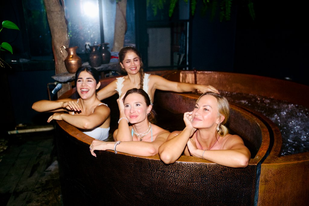 Guests in copper tub