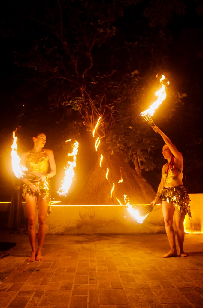 Fire spinners at Tulum beach event